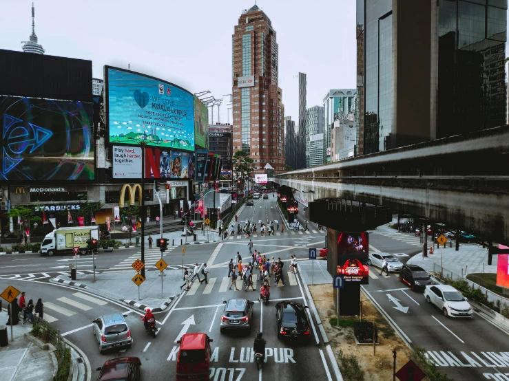 a busy city street filled with lots of traffic, inspired by Thomas Struth, pexels contest winner, hyperrealism, malaysian, square, billboard image, cinematic footage