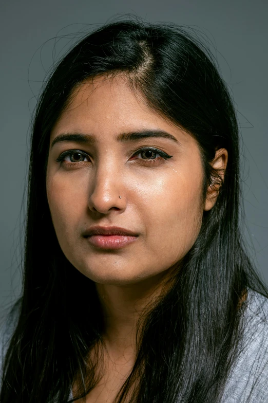 a close up of a person with long hair, reddit, hurufiyya, studio portrait, dayanita singh, passport photo, serious face