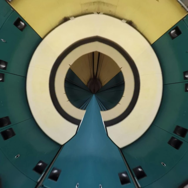 an overhead view of a spiral staircase in a building, by Doug Ohlson, retrofuturism, thunderbird 2, interior of a tent, teal paper, round doors