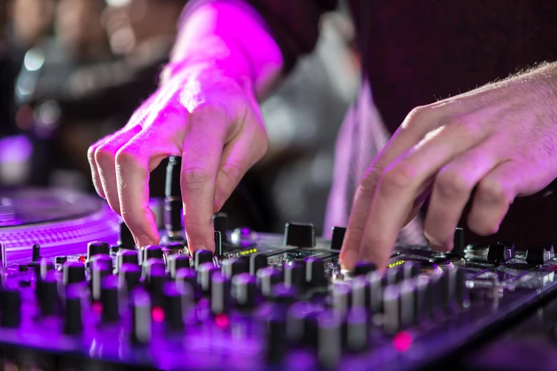 a close up of a person using a dj controller, by Tom Bonson, avatar image, panels, dsrl photo, profile picture 1024px