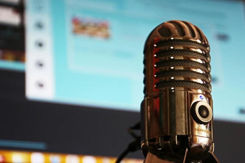 a microphone sitting in front of a computer monitor, a cartoon, unsplash, museum quality photo, banner, fan favorite, brown