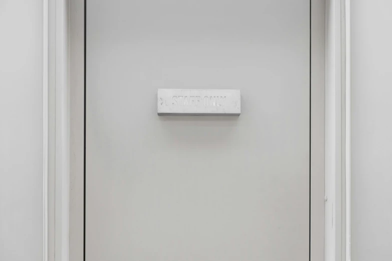 a close up of a door with a sign on it, inspired by Ian Hamilton Finlay, postminimalism, gray color, interface, white box, stainless steel