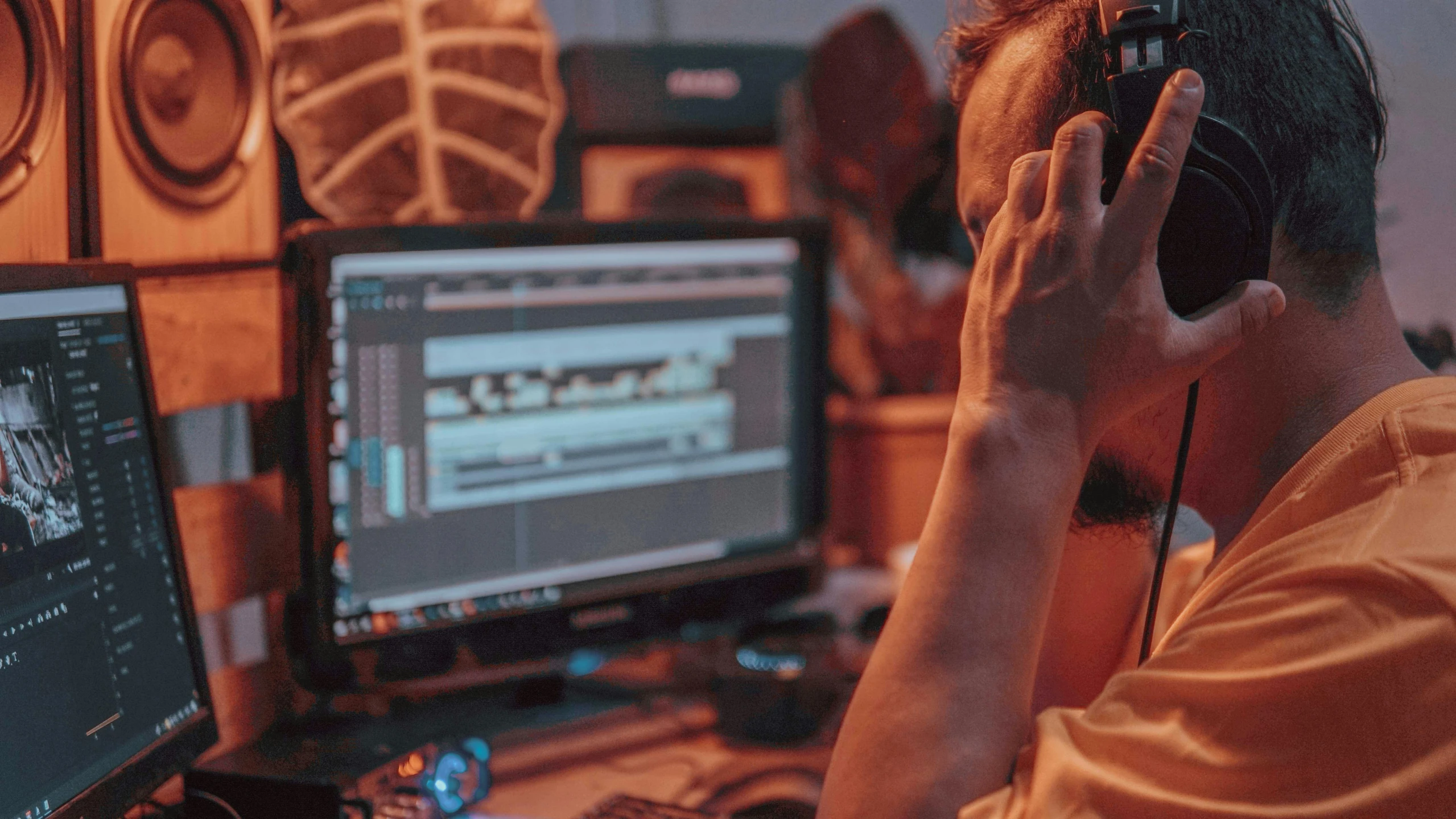 a man sitting in front of a computer with headphones on, pexels, digital art, graded with davinci resolve, jamming to music, tuned to a dead channel, instagram photo