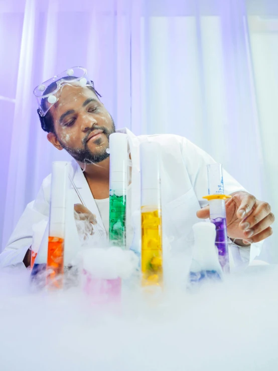 a man in a lab coat is doing a science experiment, an album cover, inspired by Dr. Atl, pexels contest winner, patron saint of 🛸🌈👩🏾, dry ice, ( ( theatrical ) ), photoshoot for skincare brand