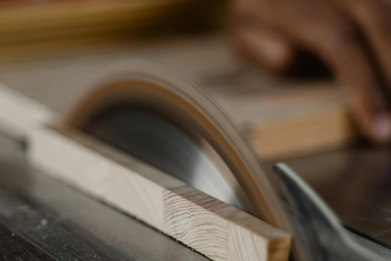 a person cutting a piece of wood with a circular saw, by David Simpson, pexels contest winner, banner, up-close, teaser, profile image