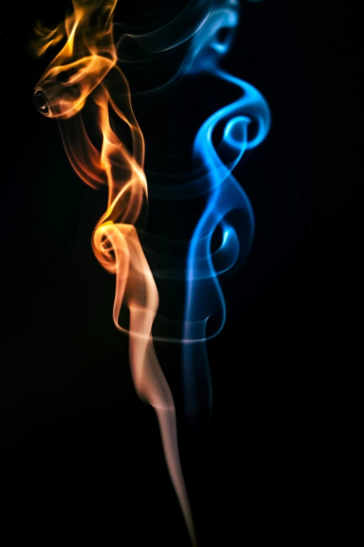 a close up of smoke on a black background, by Matt Cavotta, art photography, orange fire/blue ice duality!, paul barson, blue and white and red mist, avatar image