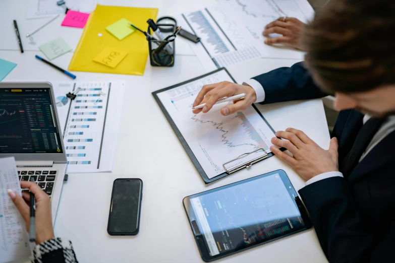 a group of people sitting at a table with laptops, trending on pexels, analytical art, charts, thumbnail, inspect in inventory image, ash thorp khyzyl saleem