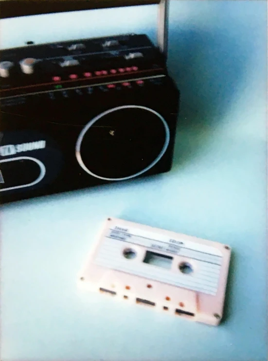 a cassette player sitting next to a cassette recorder, an album cover, ((still life)), instagram picture, 1996)