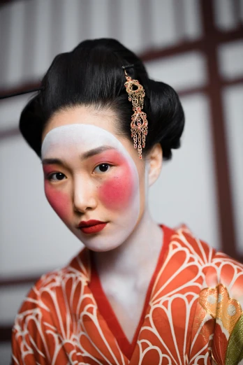 a woman in a kimono is posing for a picture, a portrait, inspired by Uemura Shōen, trending on unsplash, white facepaint, red cheeks, portrait”, hyperrealism photo