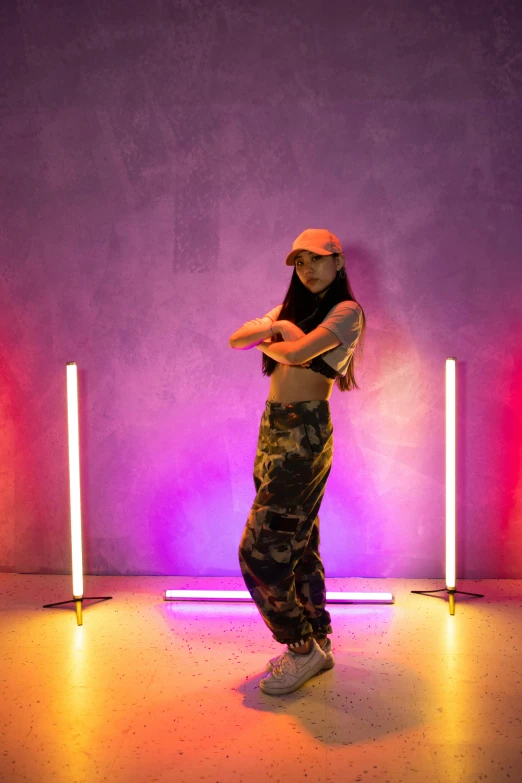 a woman that is standing in the middle of a room, inspired by David LaChapelle, unsplash, purple and yellow lighting, doing a sassy pose, asian female, long boi