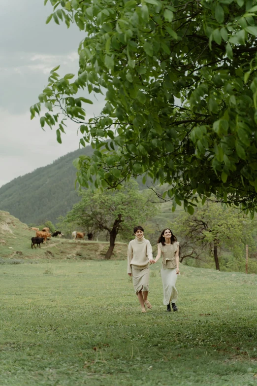 a man and a woman walking in a field, inspired by Nam Gye-u, 8 k film still, turkey, lush surroundings, exterior shot