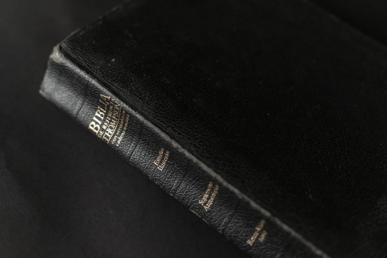 a black book sitting on top of a table