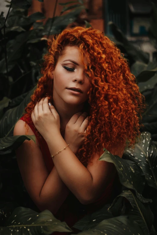 a woman with red curly hair posing for a picture, an album cover, inspired by Elsa Bleda, trending on pexels, lush greens, beautiful mexican woman, thick hair, large)}]