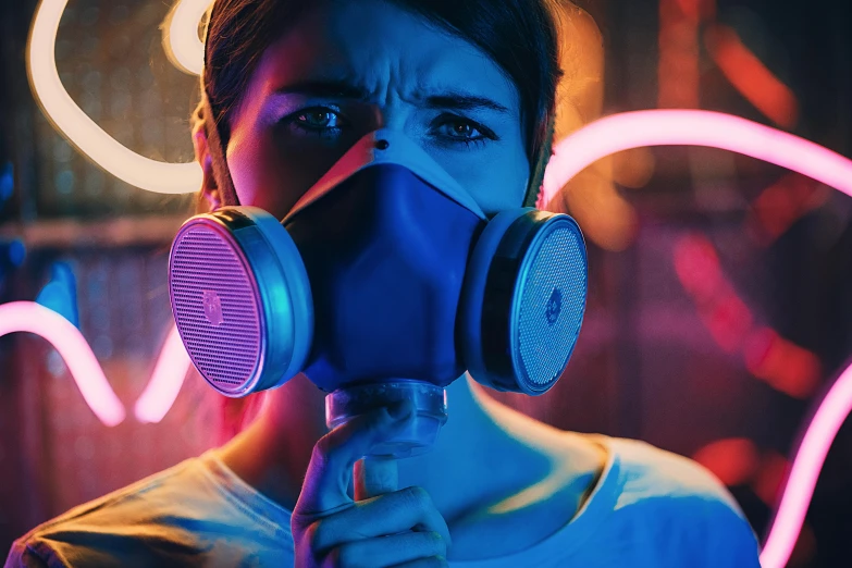 a close up of a person wearing a gas mask, cyberpunk art, by Adam Marczyński, pexels contest winner, pink and blue neon, cyberpunk teenager bedroom, instagram post, headphones dj rave