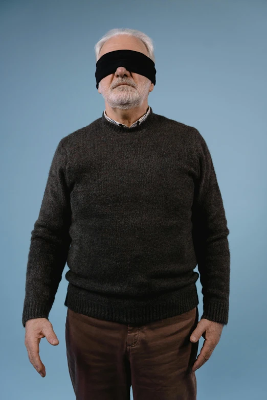 a man with a blindfold on his face, trending on reddit, photorealism, wearing casual sweater, full body photograph, old male, official product photo