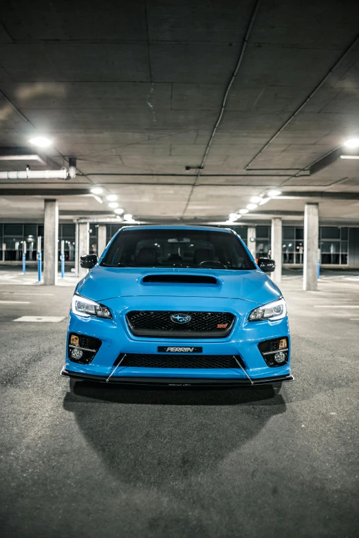 a blue subarunt parked in a parking garage, inspired by An Gyeon, wrx golf, front lighting, f/8.0, low profile