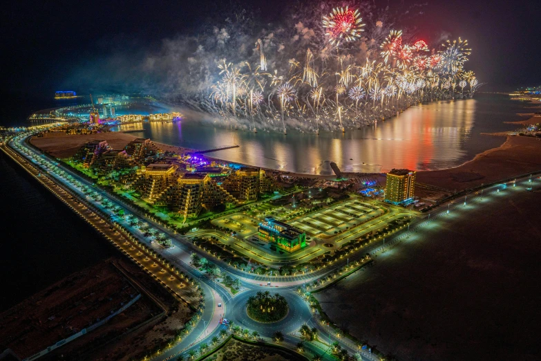 fireworks light up the night sky over a large body of water, an album cover, by Abdullah Gërguri, pexels contest winner, complex city, aerial photography, 000 — википедия, olympics ceremony