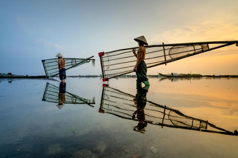 a couple of people standing on top of a body of water, a picture, inspired by Steve McCurry, unsplash contest winner, trireme, indonesia national geographic, fishing, mirrors