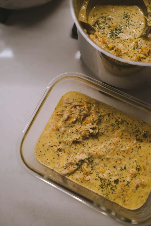 a close up of two pans of food on a table, creamy, thumbnail, blonde crea, top lid