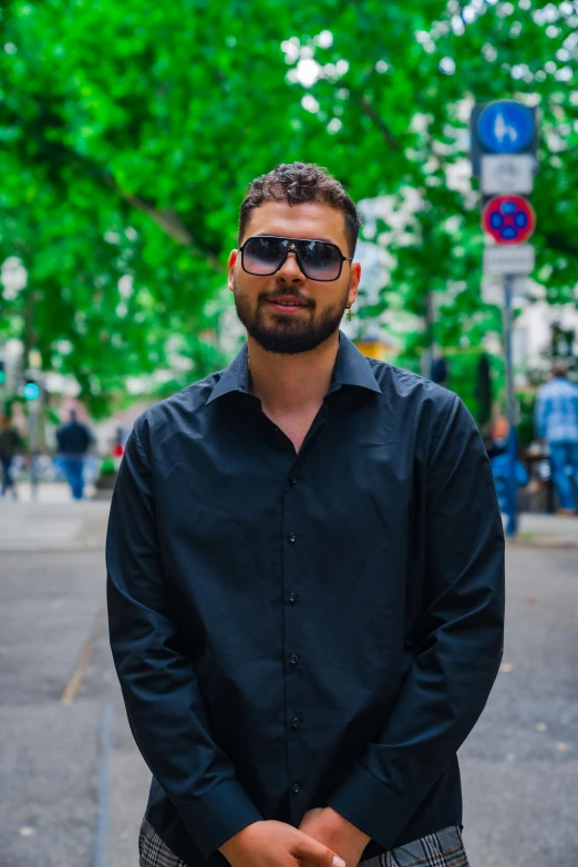 a man standing in the middle of a street, with a beard and a black shirt, square, darius zawadzki, heavily upvoted