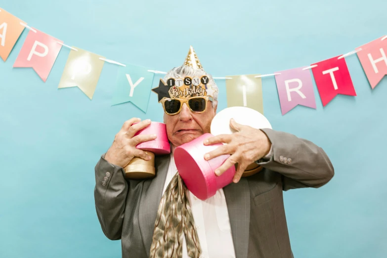 a man wearing a birthday hat and sunglasses, unsplash, an elderly, photo booth, holding a balloon, wrinkles and muscle tissues