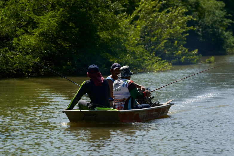 a couple of people that are in a boat, hurufiyya, fishes swimming, profile image, malaysia jungle, thumbnail