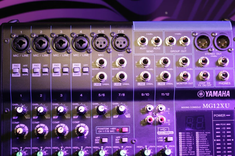 a close up of a mixer on a table, multiple purple halos, panel, performing, purple