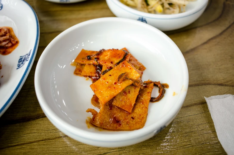 a close up of a plate of food on a table, mingei, spicy, square, crisp image, taejune kim