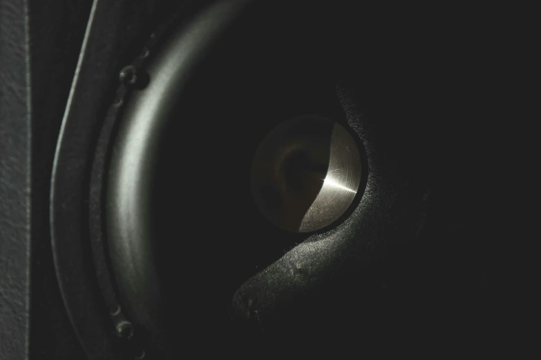 a close up of a speaker in a dark room, an album cover, unsplash, purism, subwoofer, black round hole, tannoy, 8 k smooth