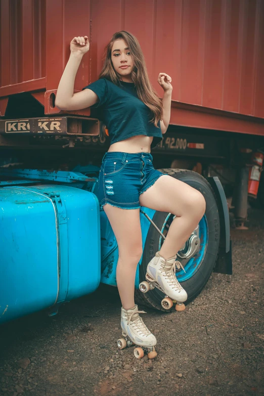 a woman riding a skateboard next to a blue truck, a colorized photo, pexels contest winner, croptop and shorts, avatar image, jeans and t shirt, 15081959 21121991 01012000 4k