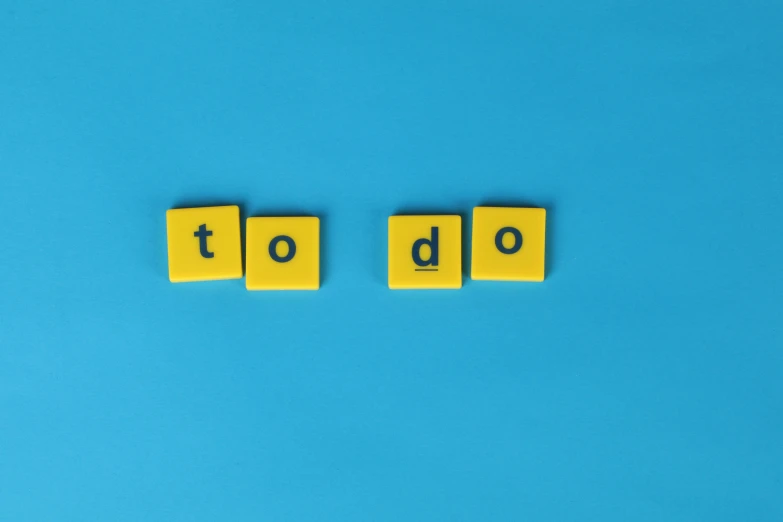 the word job spelled with yellow tiles on a blue background, by Robbie Trevino, trending on unsplash, knolling, taken on go pro hero8, procrastination, list