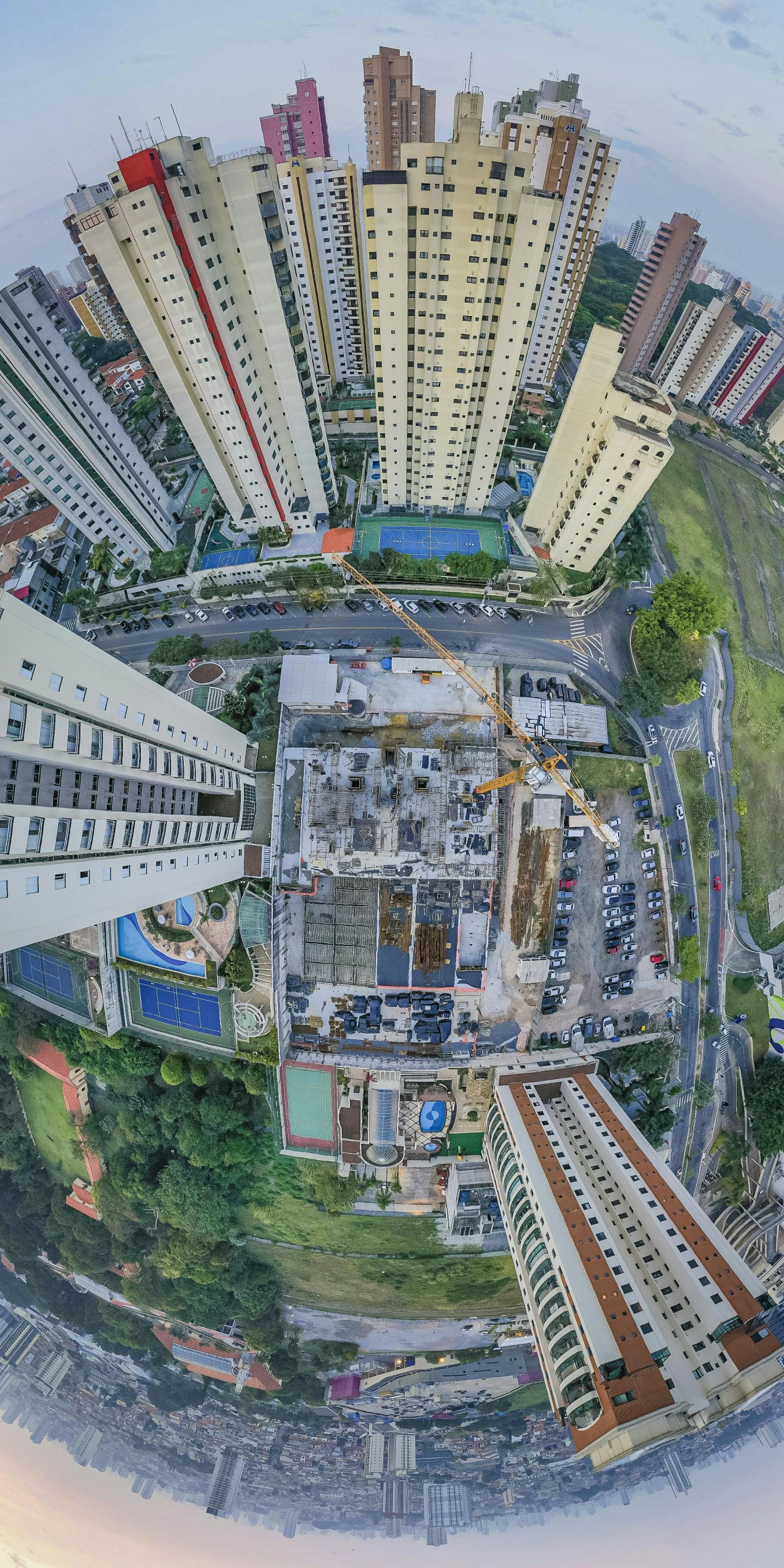 a panoramic view of a city from a bird's eye view, an album cover, by Joze Ciuha, pexels contest winner, photorealism, singapore ( 2 0 1 8 ), construction site, taken on go pro hero8, concrete housing