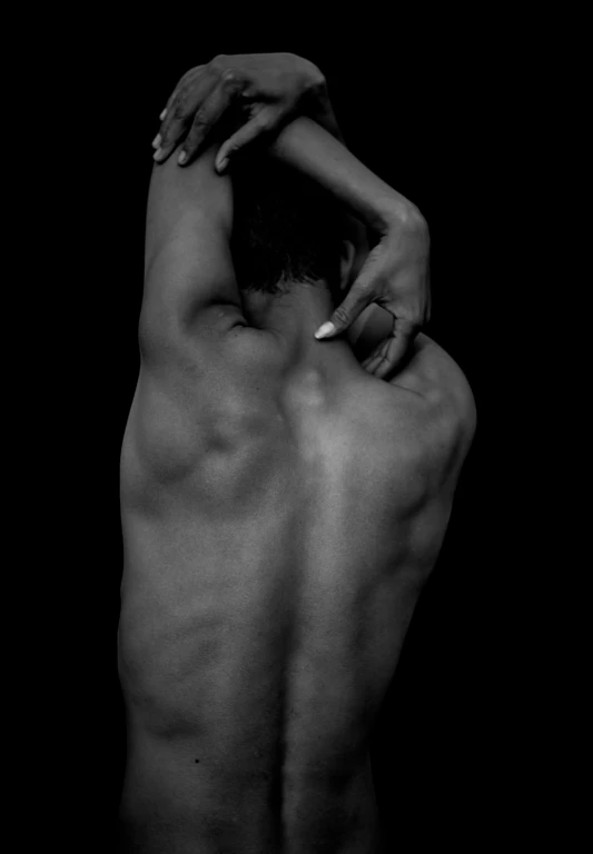 a black and white photo of a woman's back, a black and white photo, inspired by Robert Mapplethorpe, man is with black skin, full body cgsociety, armpit, pain