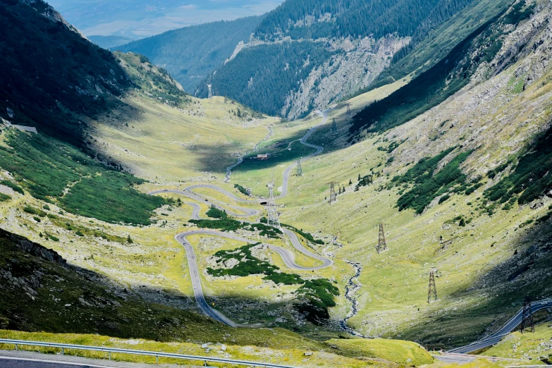 a winding mountain road in the middle of a valley, by Emma Andijewska, pexels contest winner, renaissance, romanian heritage, 2 5 6 x 2 5 6 pixels, festivals, panels