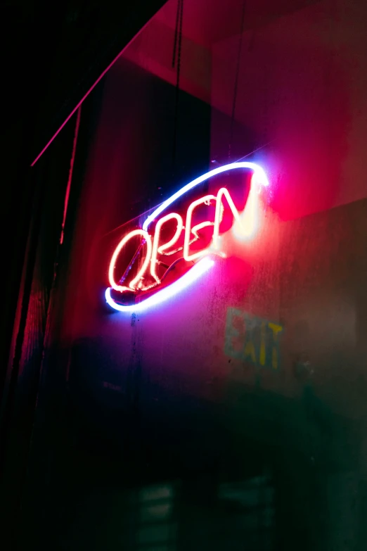 a neon sign on the side of a building, pexels, open door, open space, profile image, open top