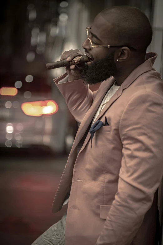 a man in a suit smoking a cigarette, inspired by Paul Georges, pexels contest winner, mc ride, wearing a pink tux, nyc, riyahd cassiem