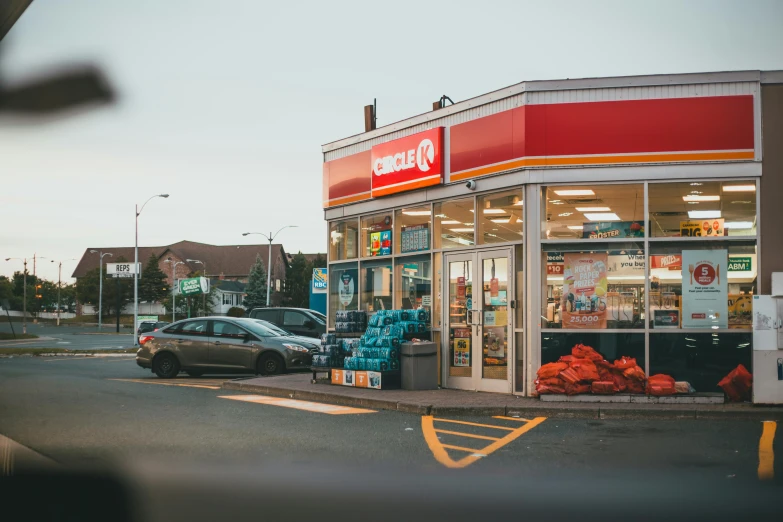 a car is parked in front of a grocery store, chillhop, petrol energy, circle pit, fast food review