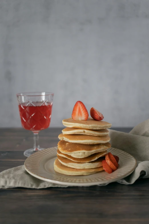 a stack of pancakes with strawberries on a plate, a still life, unsplash, drink, background image, oasis infront, kek