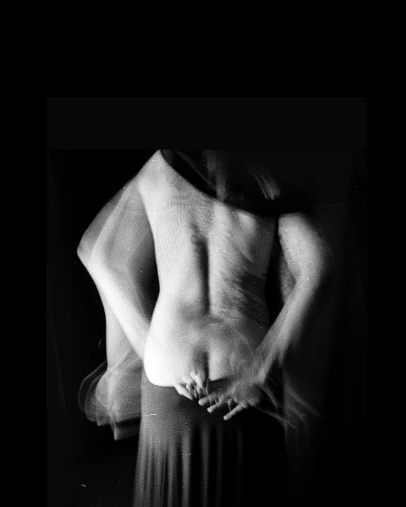 a black and white photo of a woman in a dress, inspired by Germaine Krull, unsplash, figurative art, male body, lower back, medium format, multiple exposure