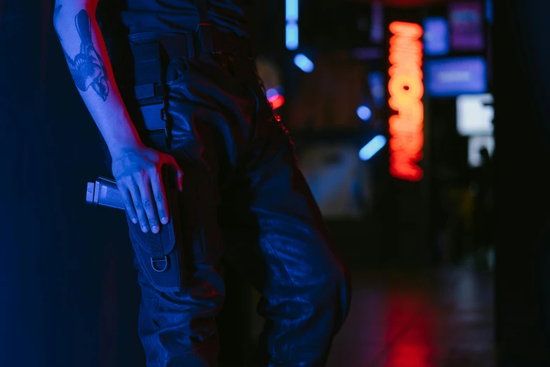 a man with a gun standing in a dark room, cyberpunk art, inspired by Elsa Bleda, close-up on legs, standing in a starbase bar, outfit: cop, cargo pants. cyberpunk city