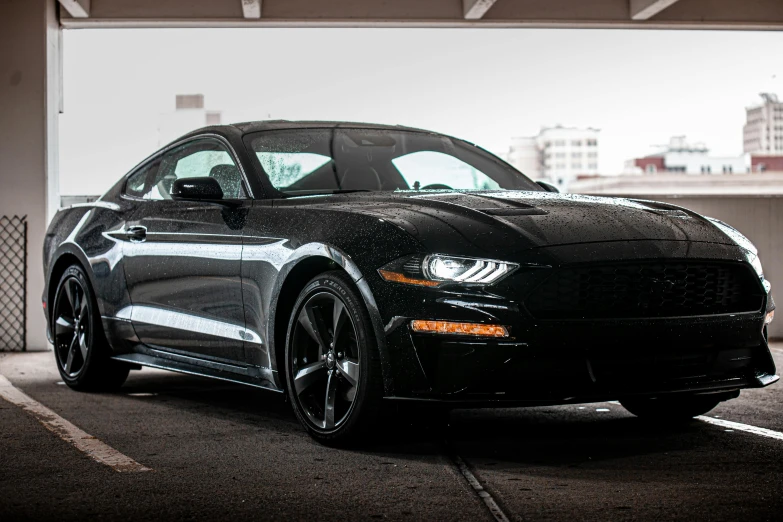 a black mustang parked in a parking garage, pexels contest winner, instagram picture, slight overcast lighting, shot on canon eos r 5, detailed high resolution