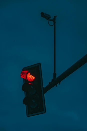 a traffic light that has a red light on it, an album cover, unsplash contest winner, dark blue, concerned, square, red
