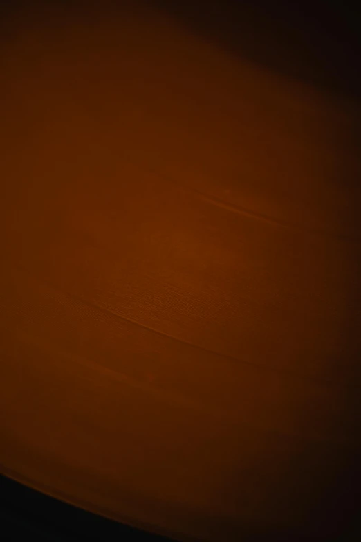 a man riding a snowboard down a snow covered slope, a picture, by Daniel Seghers, trending on polycount, color palette is dark orange, full frame image, dark chocolate painting, soft light - n 9