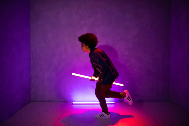 a person with a light saber in a room, an album cover, pexels contest winner, light and space, purple scene lighting, bounce lighting, rgb wall light, instagram post