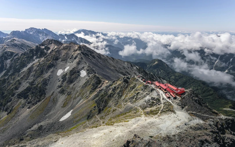 a group of people standing on top of a mountain, murata range, avatar image, large scale photo, runway photo