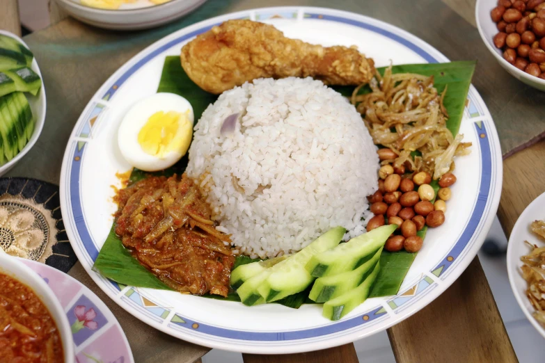 a close up of a plate of food on a table, inspired by Aya Goda, pexels contest winner, hurufiyya, malaysian, square, rice, youtube thumbnail