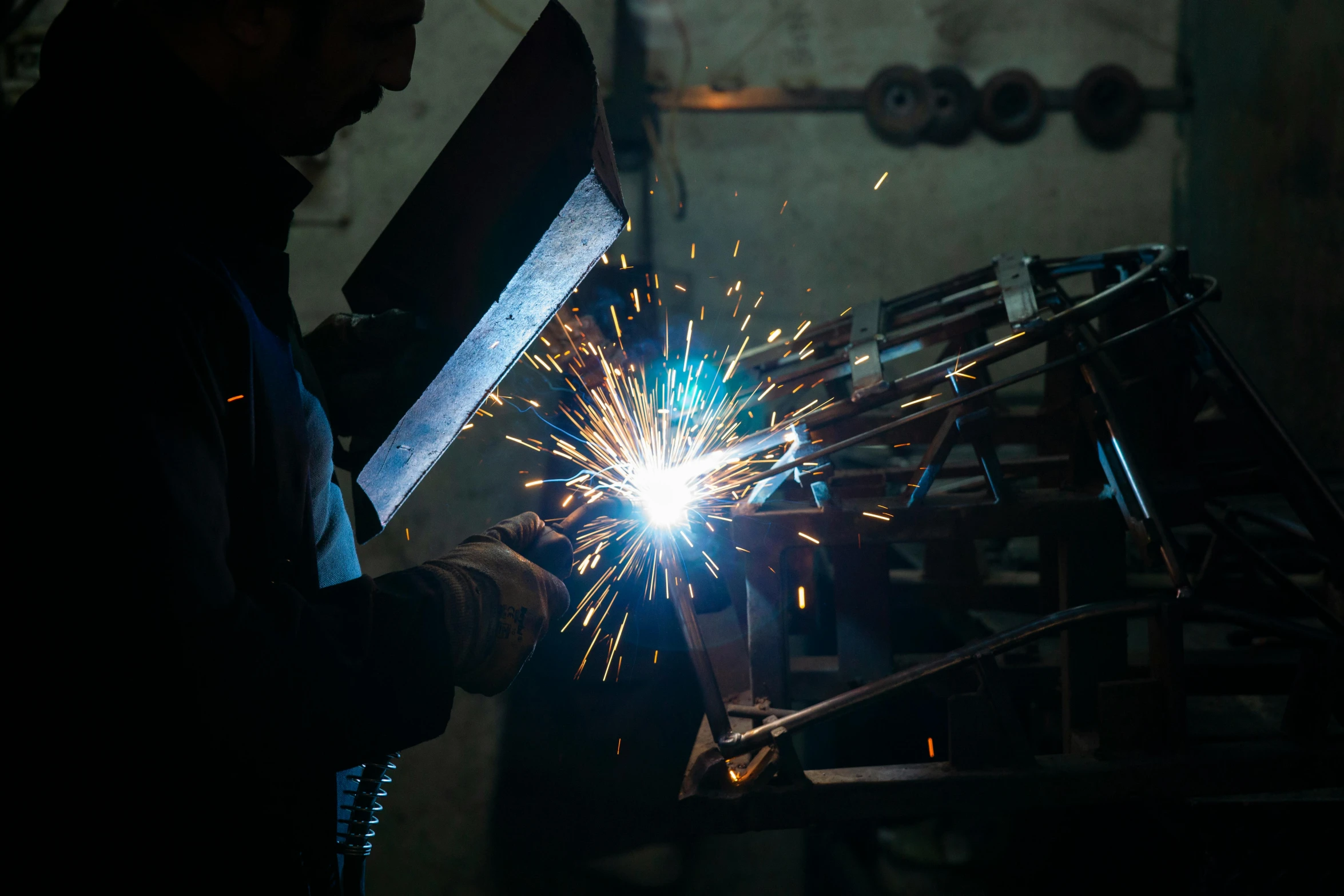 a welder working on a piece of metal, pexels contest winner, renaissance, avatar image, medium portrait, rectangle, classic portrait