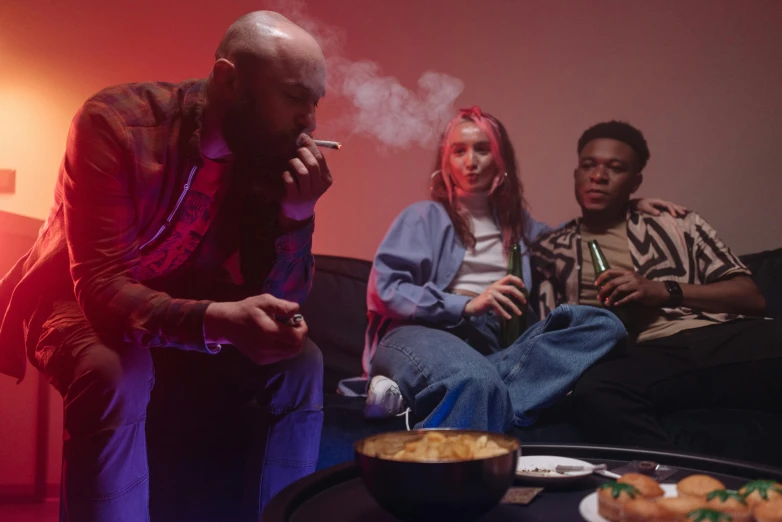 a group of people sitting on top of a couch, pexels, realism, smoking a bowl of hash together, muted neon smoke, mkbhd, charli bowater and artgeem