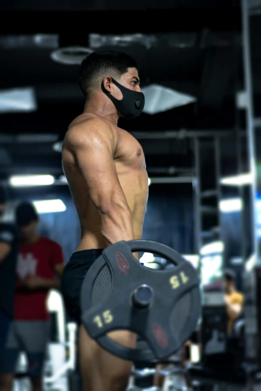 a shirtless man lifting a barbell in a gym, by Robbie Trevino, wearing facemask, saadane afif, profile image, one single mask