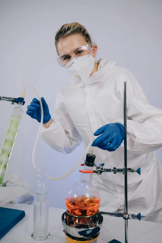 a woman in a white lab coat and blue gloves, shutterstock, analytical art, bubbling liquids, biopunk suit, russian academic,